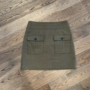 Dark green cargo style mini skirt